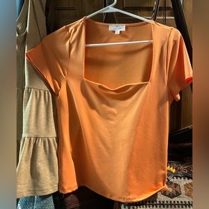 Square neck orange short sleeve shirt